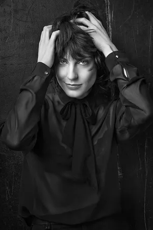 Antje Traue In Black Suit Wallpaper