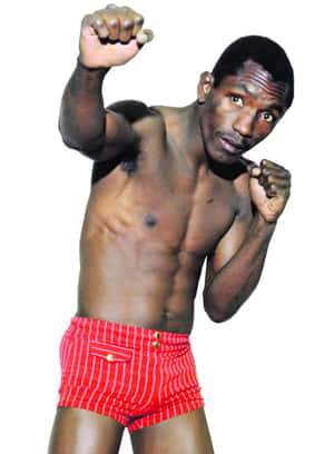 Antonio Cervantes Wearing Red Shorts On White Wallpaper