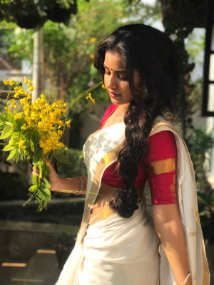 Anupama Parameswara Yellow Flower Wallpaper