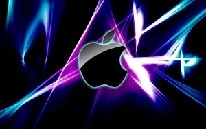 Apple Laptop - Powered By High Tech Features Wallpaper