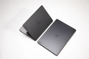 Apple Macbook In Stylish Black Color Wallpaper