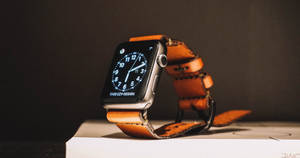 Apple Watch With Brown Leather Strap Wallpaper