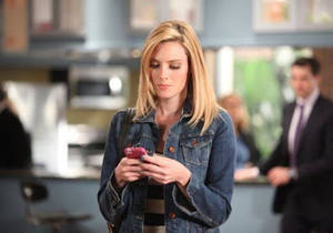 April Bowlby Using A Phone Wallpaper