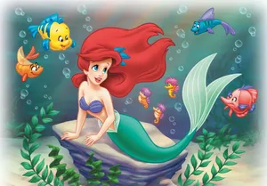 Ariel, The Little Mermaid, Dreamily Exploring A Magical Underwater World Wallpaper