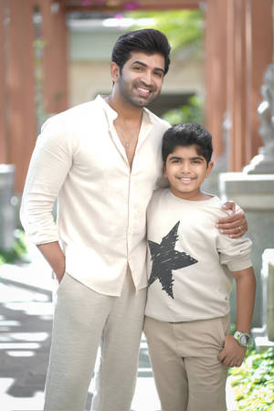 Arun Vijay Poses With A Young Fan Wallpaper