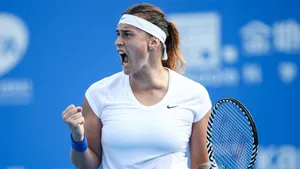 Aryna Sabalenka Expressing Intensity On The Tennis Court Wallpaper