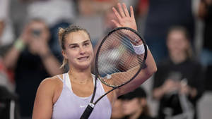 Aryna Sabalenka Waving To Her Fans Wallpaper