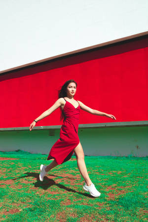 Asian Woman Wearing Fashionable Red Dress Wallpaper