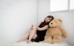 Asian Woman With Cute Teddy Bear Wallpaper