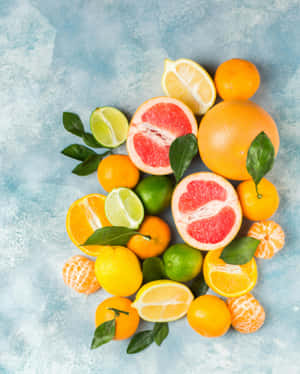 Assorted Citrus Fruits Top View Wallpaper