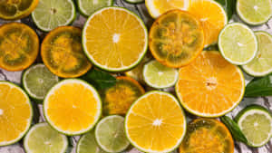 Assorted Citrus Slices Top View Wallpaper
