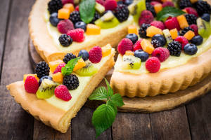 Assorted Fruit Toppings On Pie Wallpaper