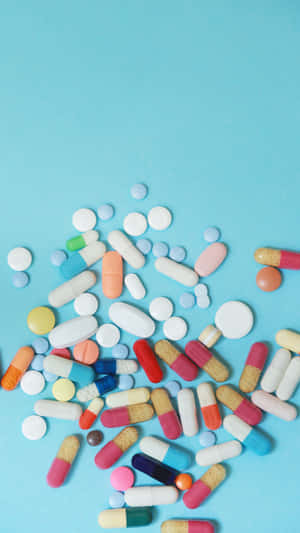 Assorted Medications Blue Background Wallpaper