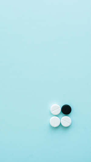 Assorted Medicationson Blue Background Wallpaper