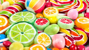 Assorted Sliced Fruits Candies Wallpaper