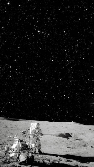 Astronaut In Moon Oled Iphone Wallpaper