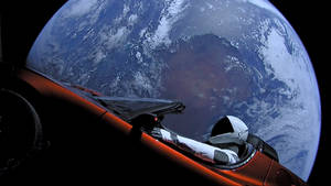 Astronaut In Space Riding A Car Wallpaper