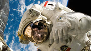 Astronaut Over Earth Desktop Wallpaper