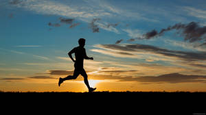 Athlete Silhouette Marathon Wallpaper