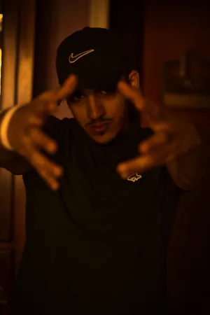 Attitude Boy In All Black Outfit Wallpaper