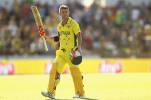 Australia's Formidable Batsman, David Warner In Action Wallpaper