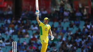 Australian Cricket Star Aaron Finch In Action Wallpaper
