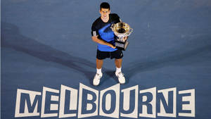 Australian Open Novak With Trophy Wallpaper