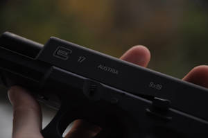 Austrian Glock-17 In Hand Wallpaper