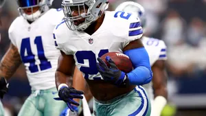 Awesome Dallas Cowboys Holding A Ball Wallpaper