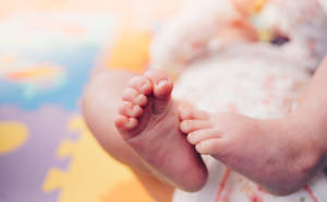 Baby Boy With Little Feet Wallpaper