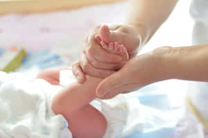 Baby Foot Sole Massage Wallpaper