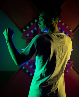 Backshot Of Taila Santos In Fighting Pose Wallpaper