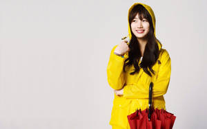 Bae Suzy In Yellow Raincoat Wallpaper