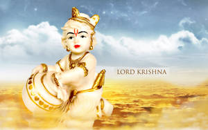 Bal Krishna Figurine Over Gold Clouds Wallpaper