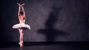 Ballet Dancer In Tiptoe Pose Wallpaper