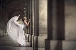 Ballet Dancer Leaning On Pillar Wallpaper