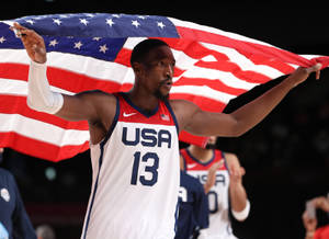 Bam Adebayo Raising American Flag Wallpaper