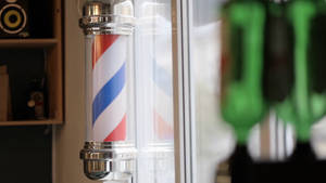 Barber Pole Beside Window Wallpaper
