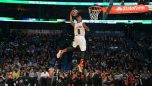 Basketball Player Mid Air Dunk Performance Wallpaper