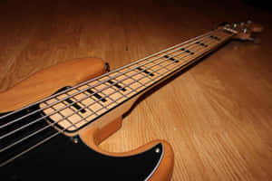 Bass Guitar On The Floor Wallpaper