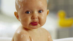 Bathing Baby Funny Face Wallpaper