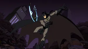 Batman Facing Off The Criminals In Gotham City Wallpaper