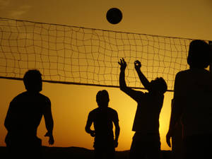 Beach Volleyball Silhouette Of Players Wallpaper