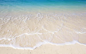 Beach Waves Hitting Sand Wallpaper
