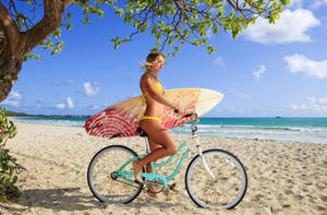 Beach Woman Bikini Bike And Surfboard Wallpaper