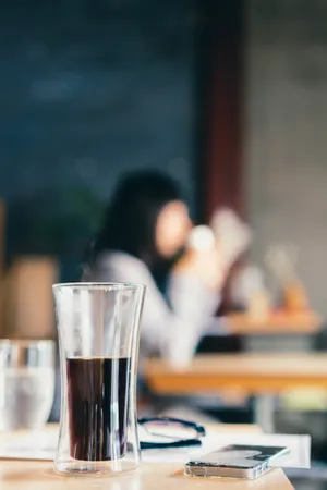 Beaker Glass On Table Wallpaper