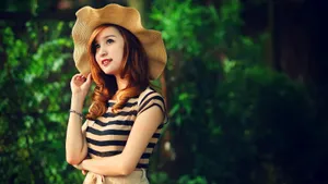 Beautiful Girl In A Sun Hat Wallpaper