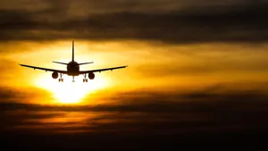 Beautiful Sunset Landing Plane Background Wallpaper