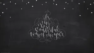 Beautifully Written Calligraphy On Chalkboard Wallpaper