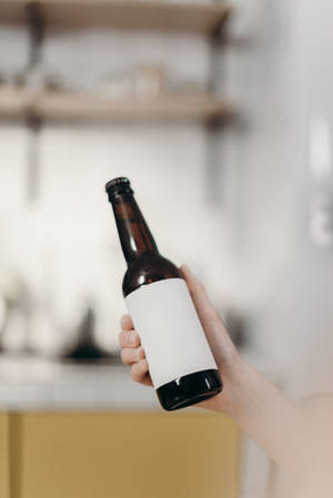 Beer Bottle With A White Label Wallpaper